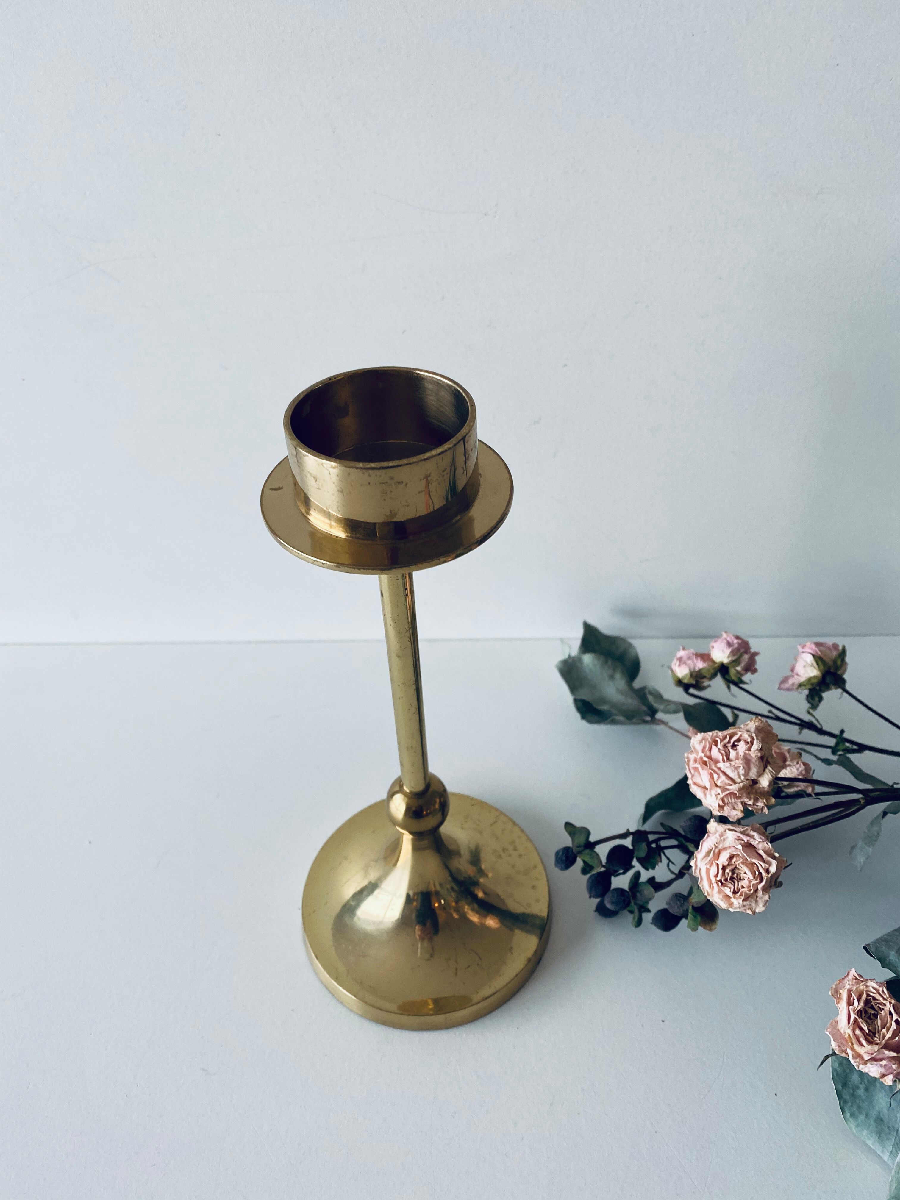 Golden brass candle door