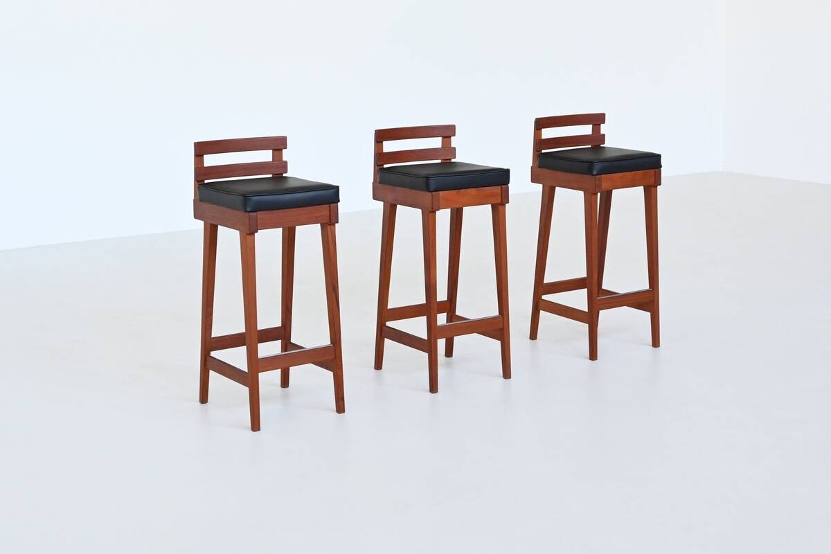 Erik Buck set of three bar stools in teak and leather Dyrlund Denmark 1960