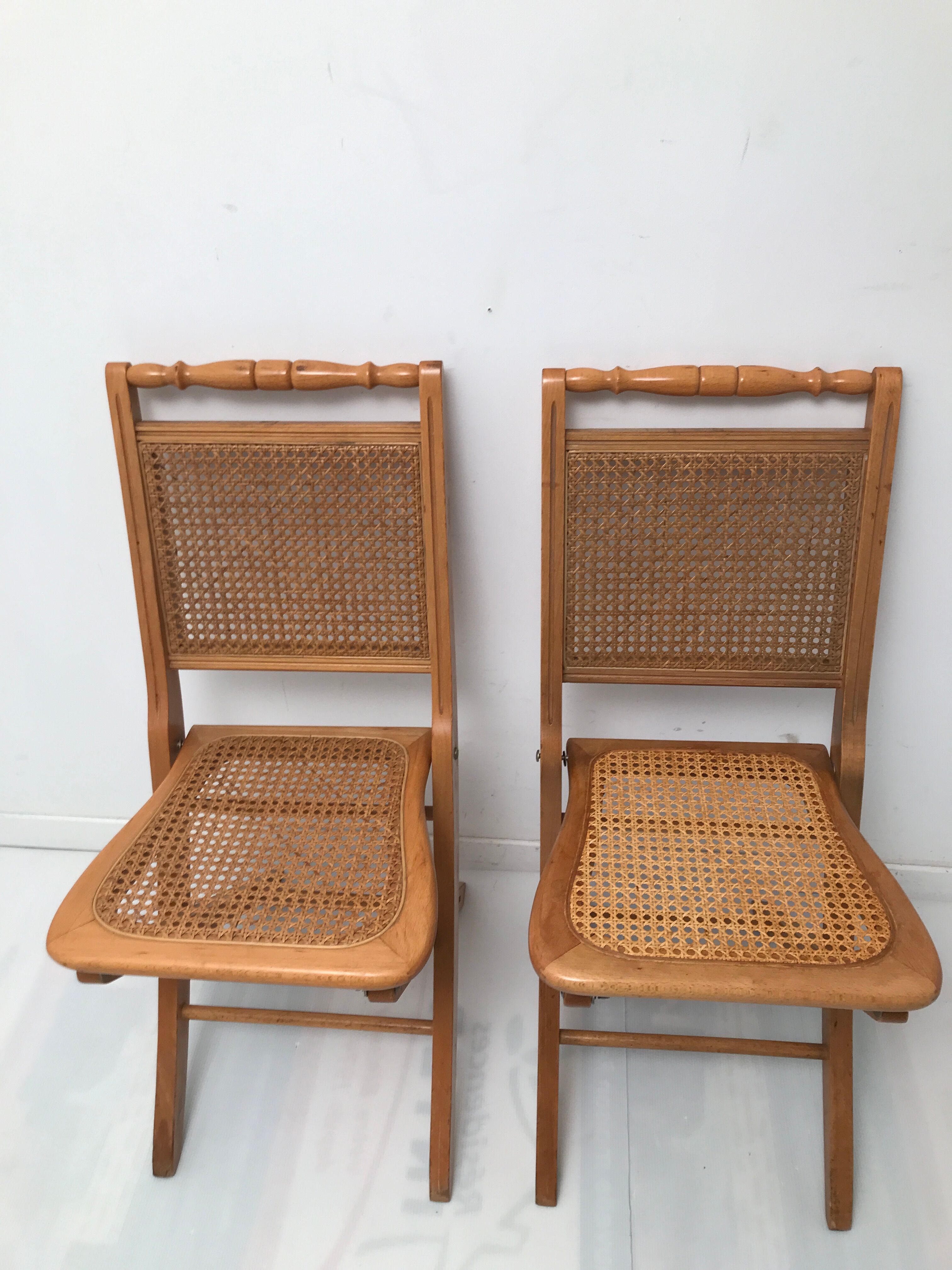 Pair vintage cannesy folding chairs