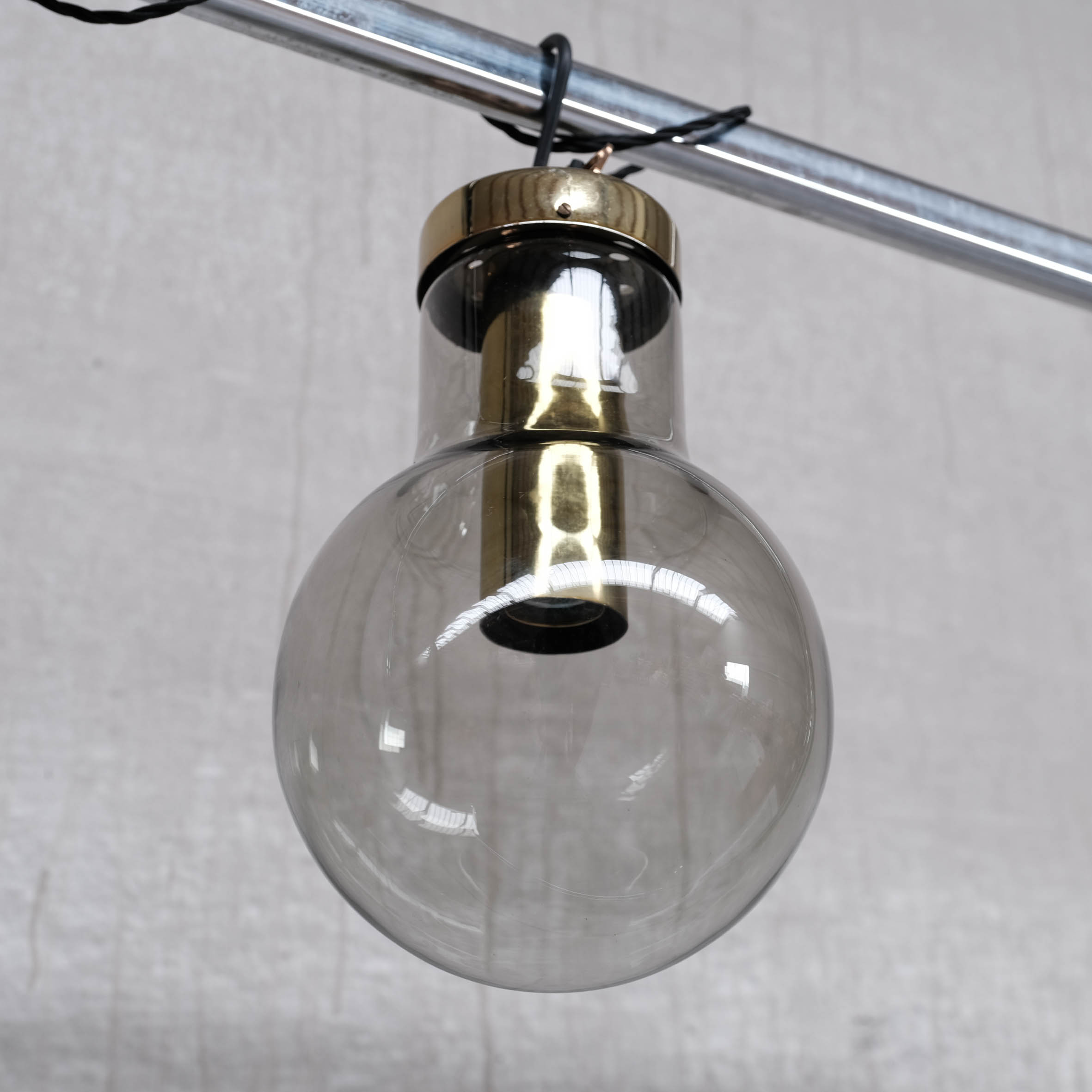 Smoked mid-century glass and brass pendant light by raak