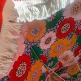 Large floral tilting beach umbrella with cotton fringes, 1960