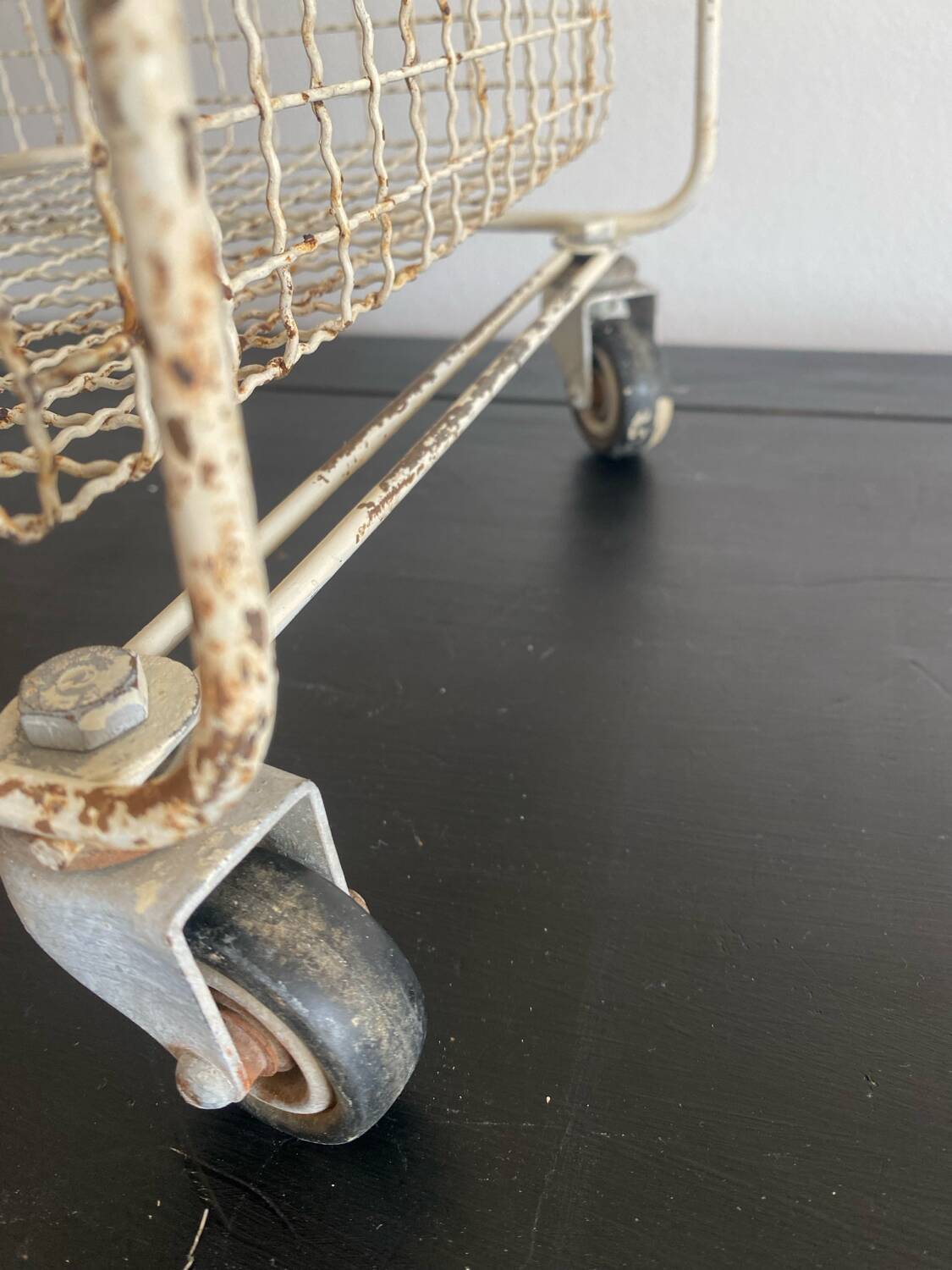 Metal serving trolley on wheels