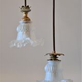 Double suspension with tulip lampshades and gold finishes