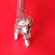 Set of 8 silver metal knife holders. Lion shape.