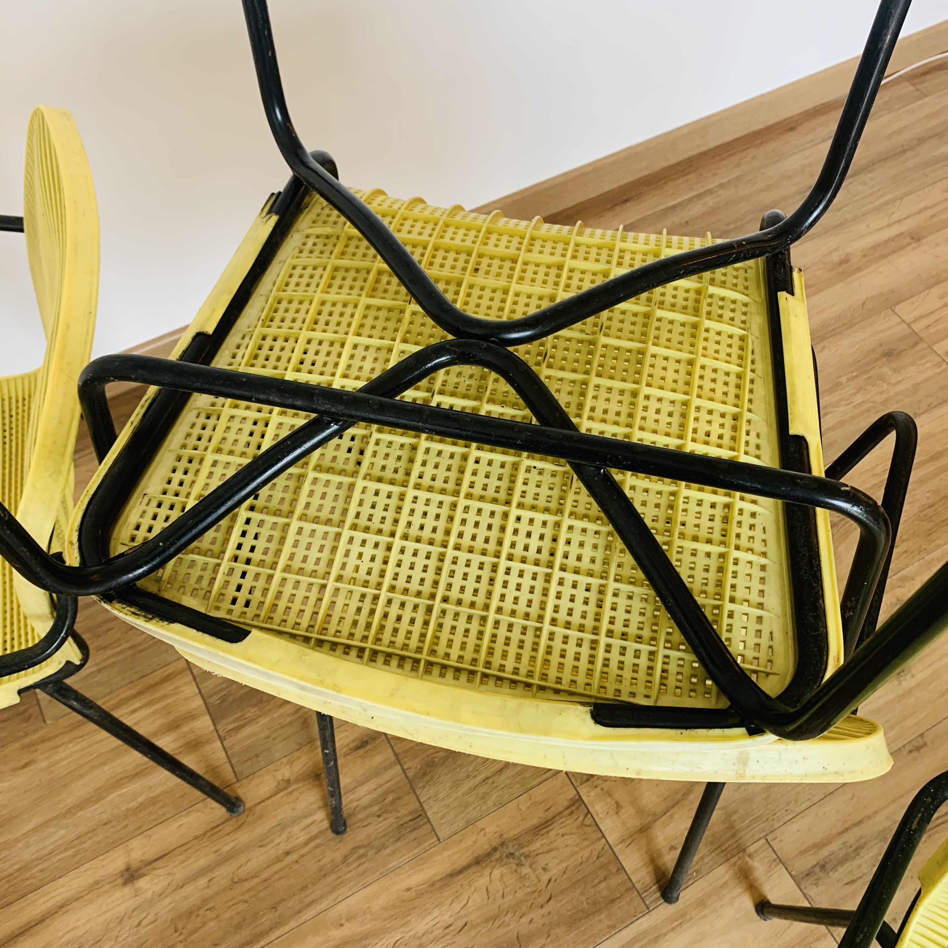 4 yellow outdoor armchairs