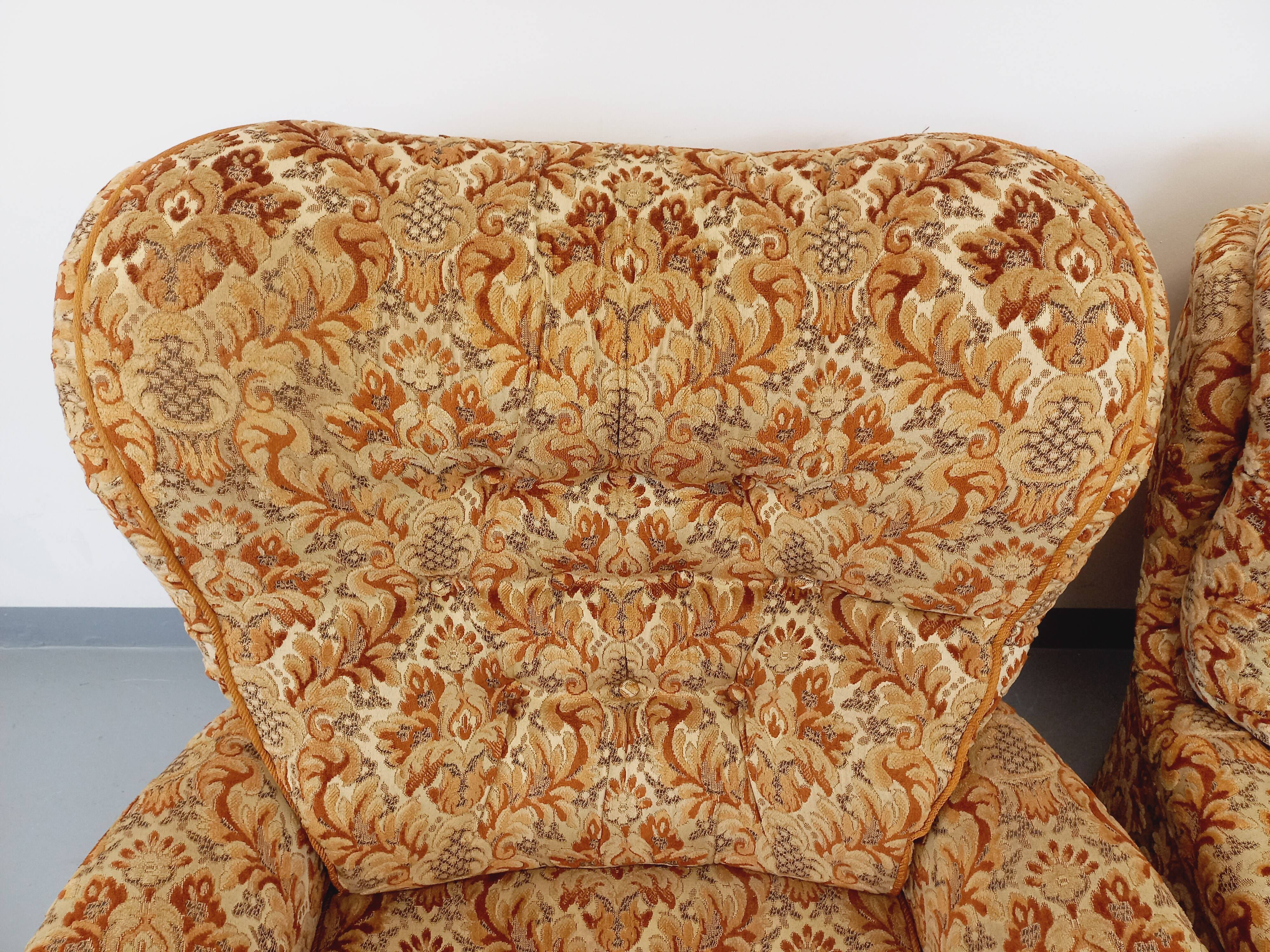 Set of 2 vintage armchairs in floral fabric with fringes from the 60s 70s
