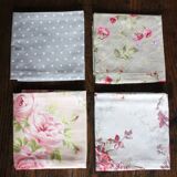 A set of 4 romantic floral polka dot napkins.
