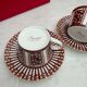 Pair of Baccarat Porcelain Coffee Cups and Saucers, Red Geometric Design