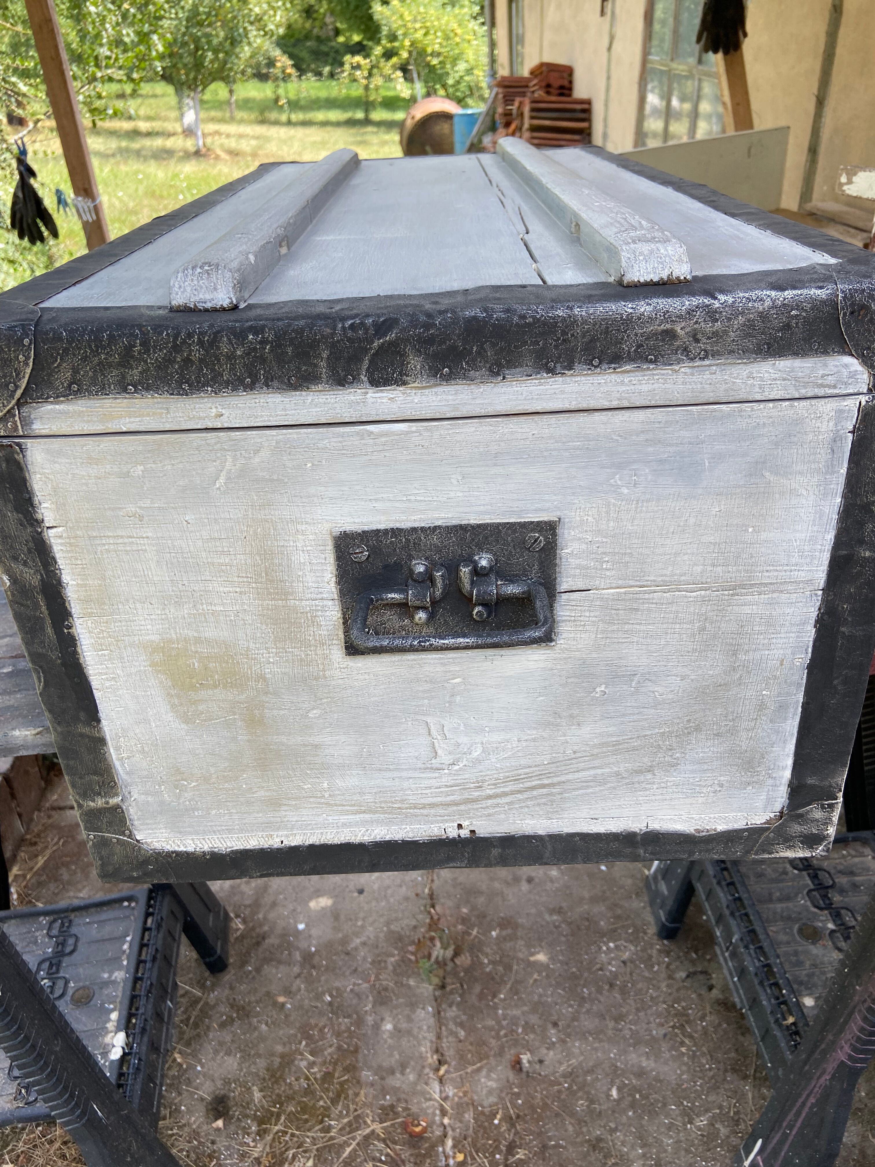 Restored wooden trunk patinated grey