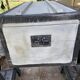 Restored wooden trunk patinated grey