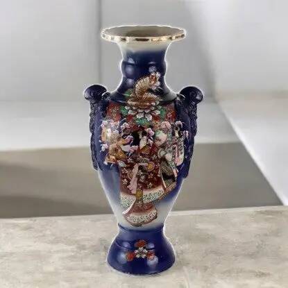 Antique ceramic vase with floral decoration, Japan, early 20th century.