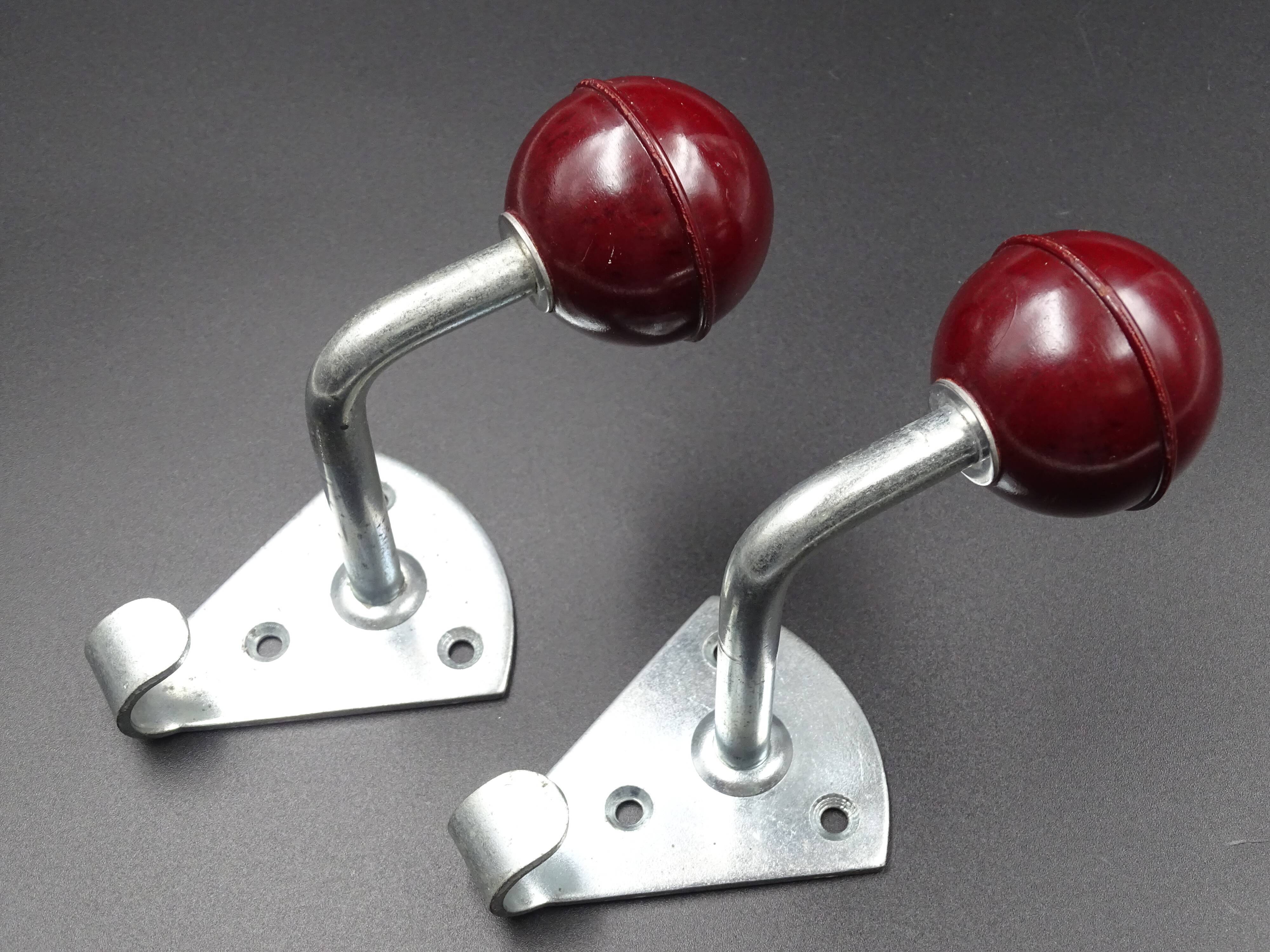 Two hooks in red bakelite and metal - around 1950