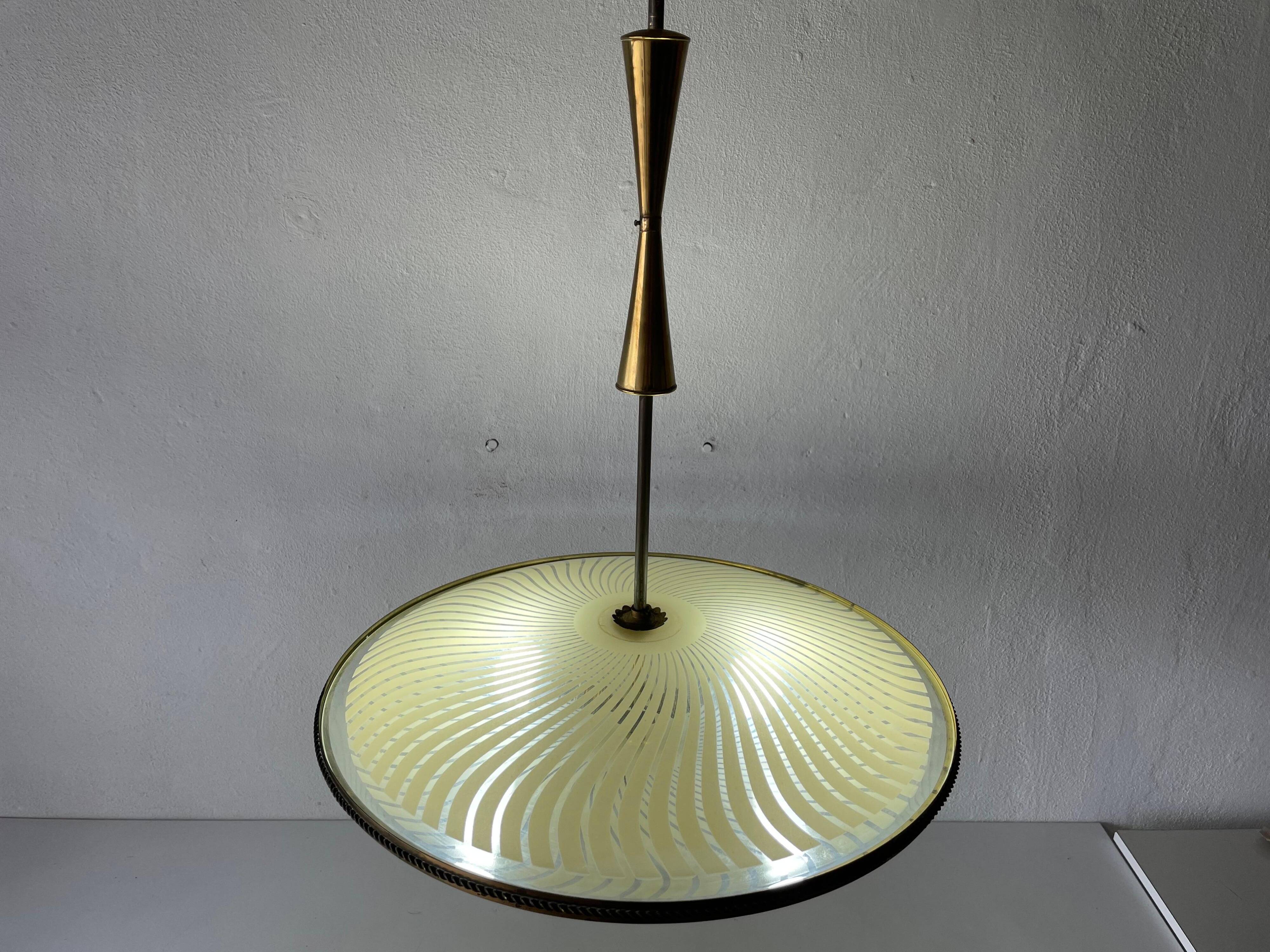 Large UFO design ceiling light in brass and printed glass, 1950s, Italy.
