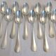 10 silver plated metal table spoons