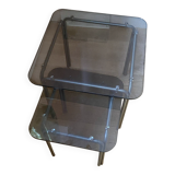 pair of smoked glass nesting tables