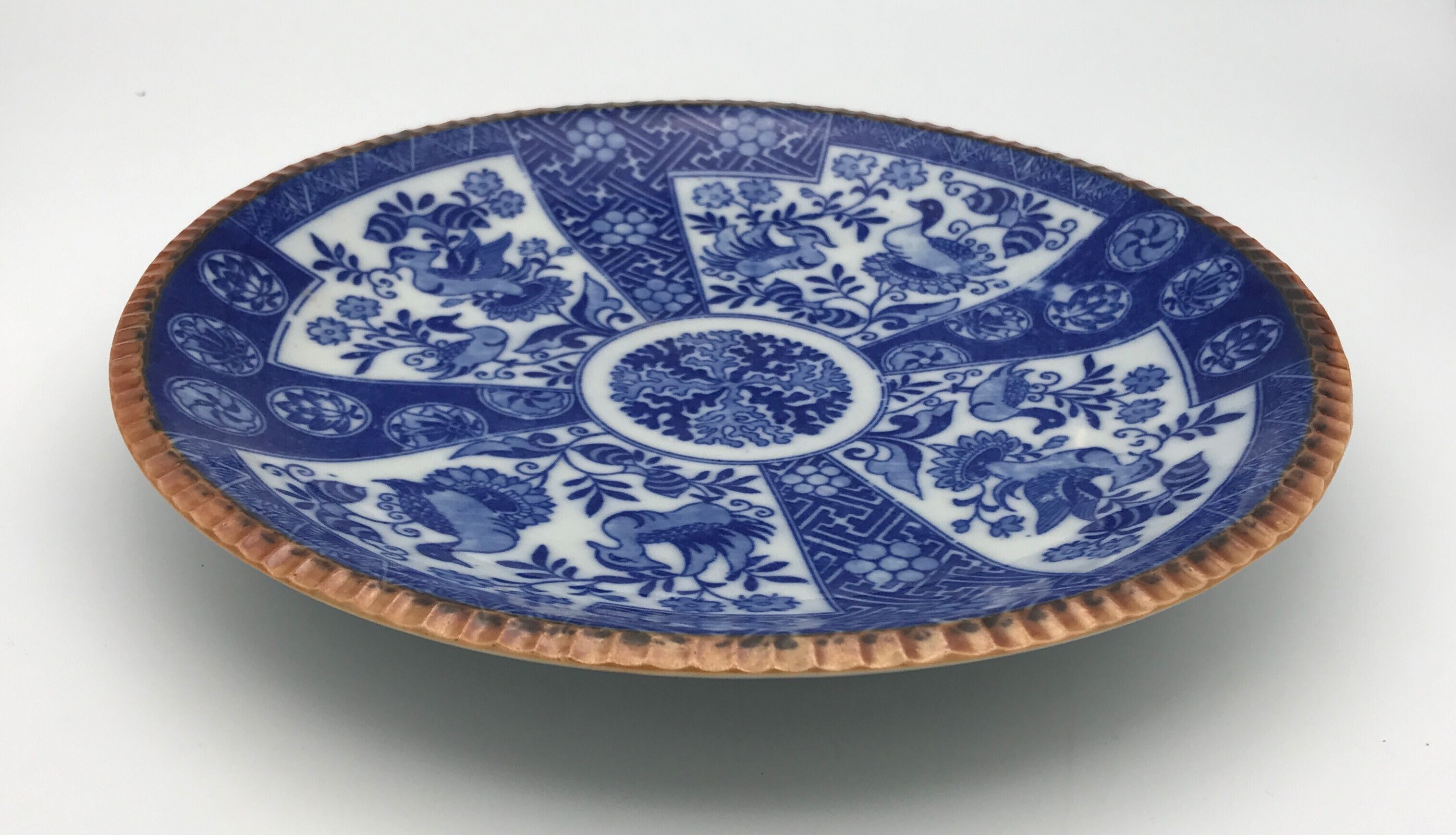 Pair of vintage japanese igezara plates decorated with floral and bird motifs