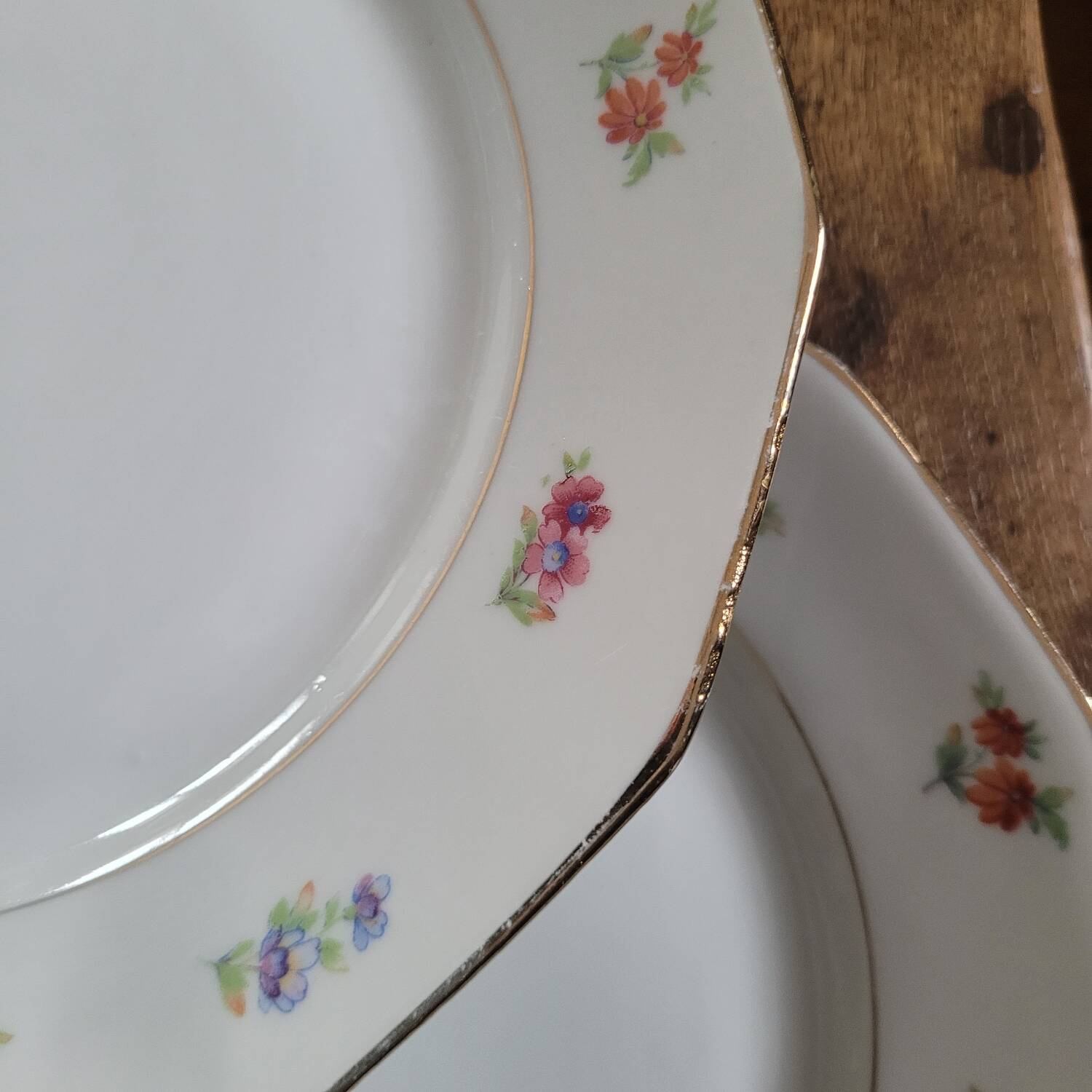 Set of 8 porcelain plates with twelve cut sides - floral decoration and