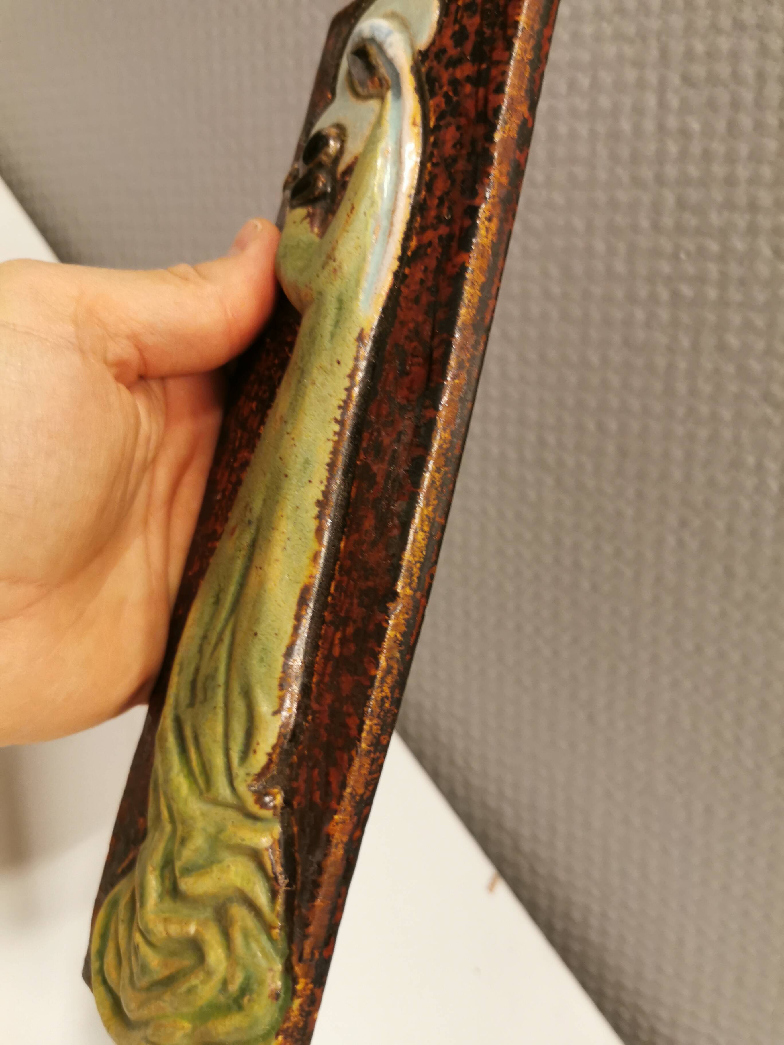 Slim relief with a motif of Madonna and child.