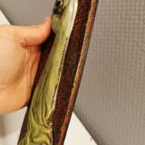 Slim relief with a motif of Madonna and child.