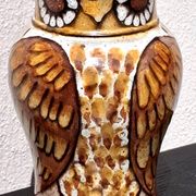 Stoneware water jug, owl decoration, signature to be identified.