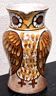 Stoneware water jug, owl decoration, signature to be identified.