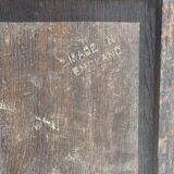 Small antique English rectangular mirror with pediment and oak frame