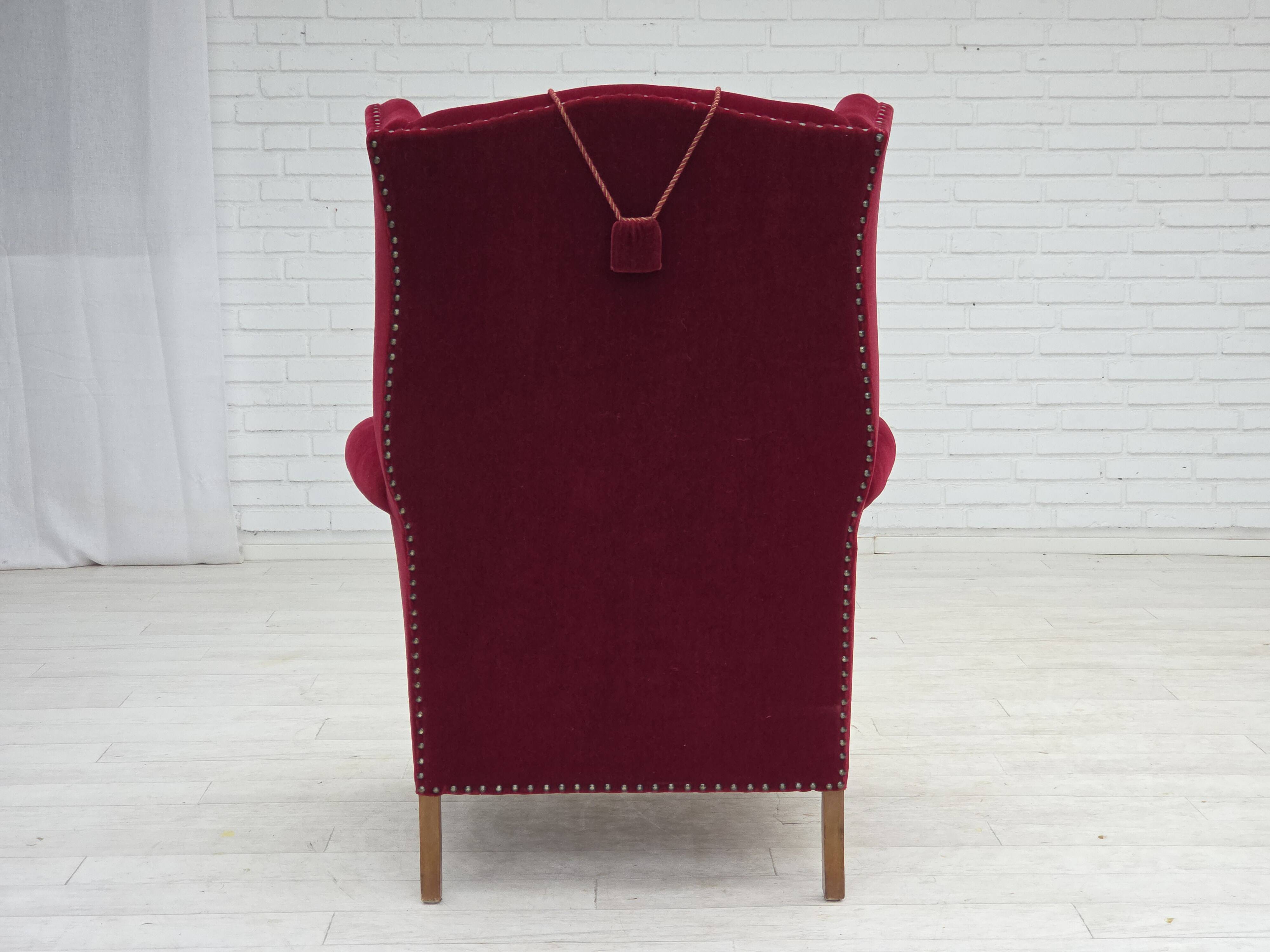 1960s, Danish highback wingback armchair, cherry-red furniture velour.