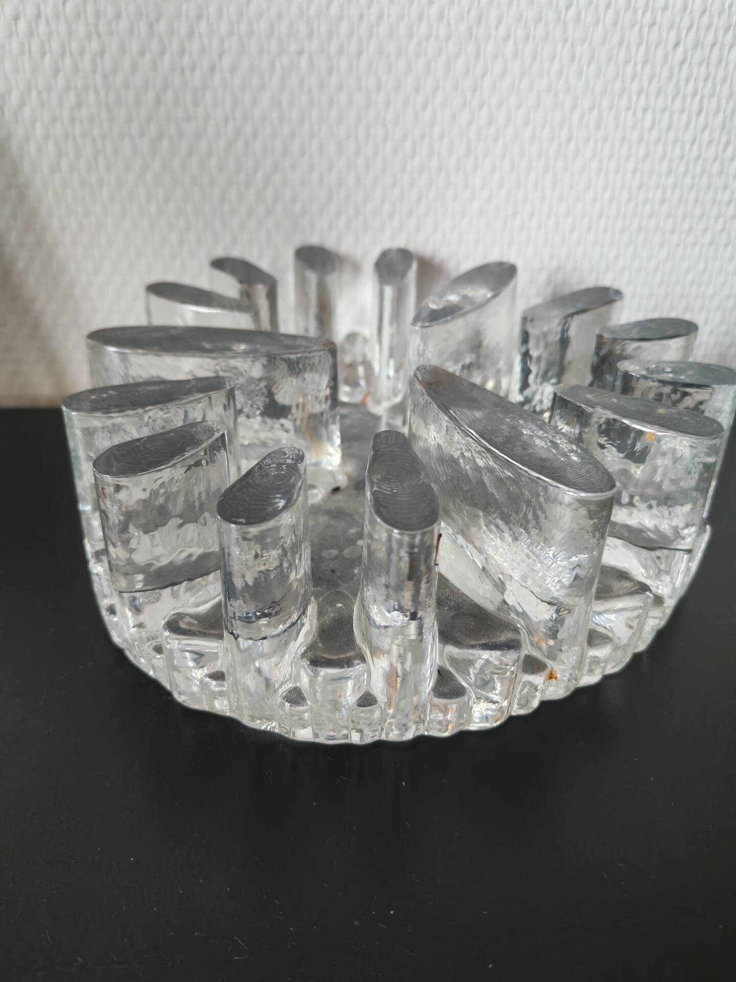 Large glass candle holder in iceberg brutalist style.
