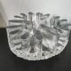 Large glass candle holder in iceberg brutalist style.