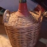 Wicker demijohn and small glass carboy