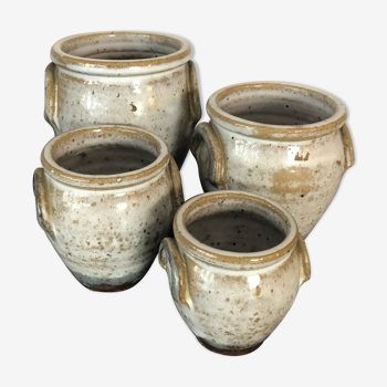 Set of 4 enamelled sandstone pots