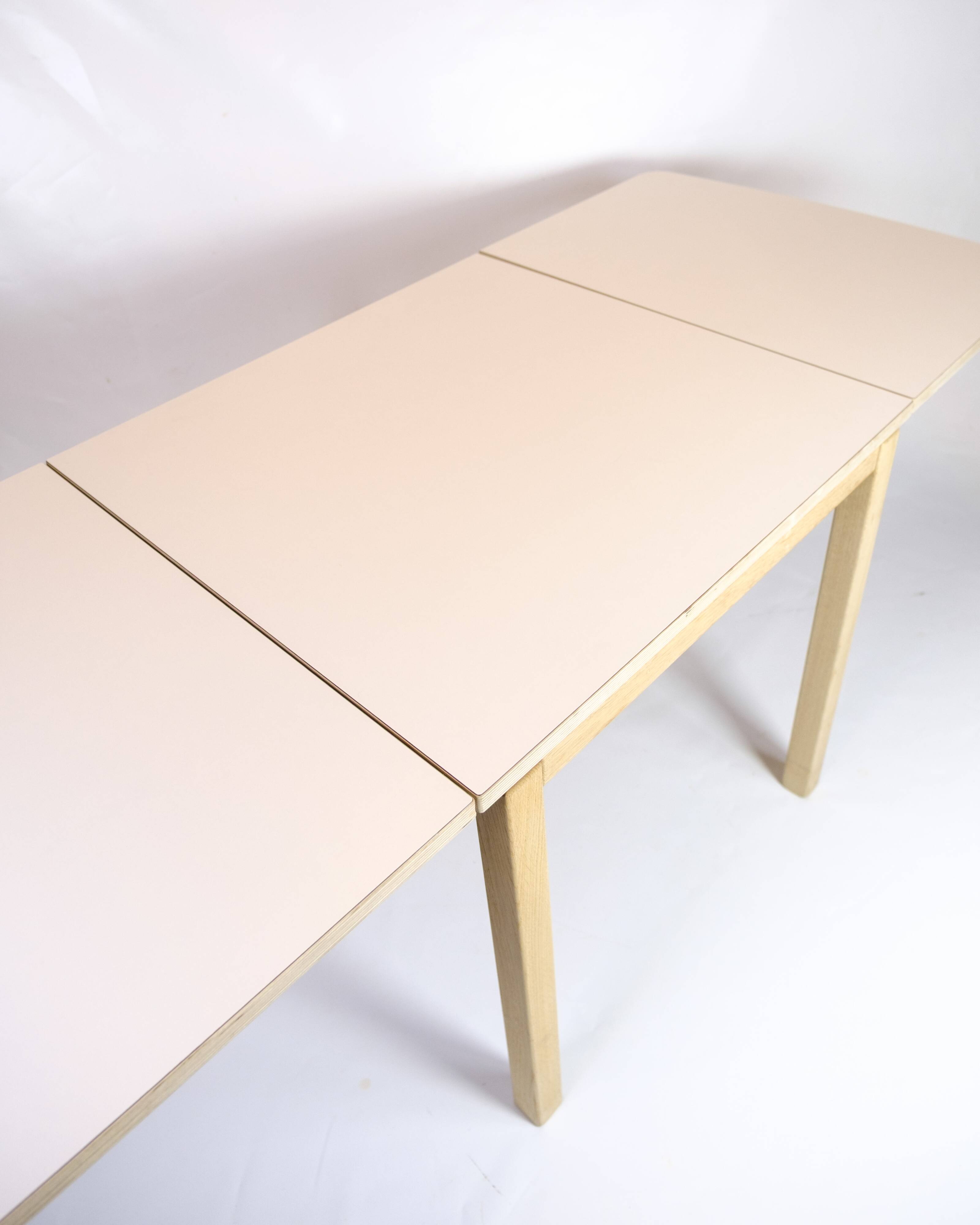Table with drop leaves - Model 517 - White laminate top - Oak - Haslev Møbelsnedkeri