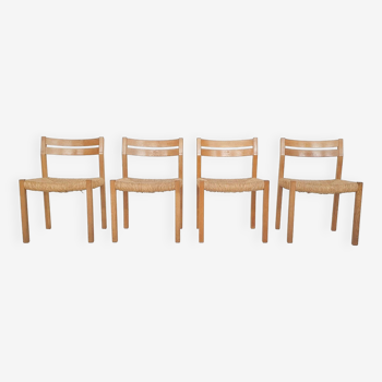 Ensemble de quatre chaises de salle à manger en chêne et sisal modèle 401 par J.L Moller, Danemark années 1970