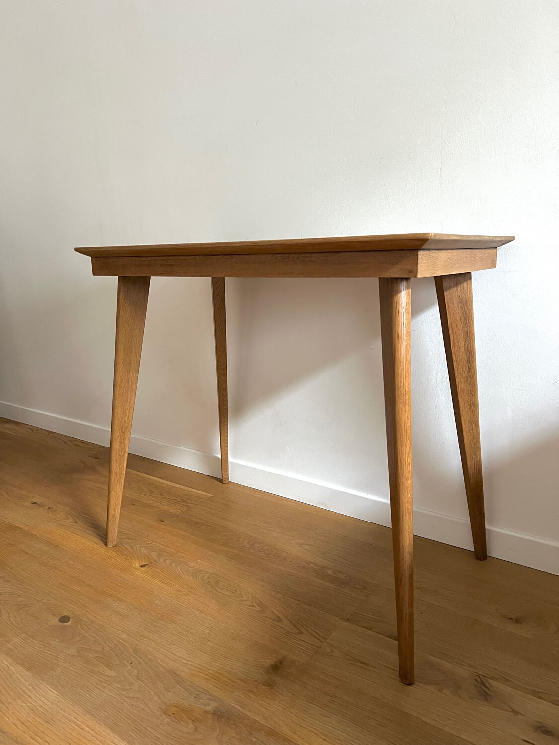 Side table with compass legs