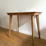 Side table with compass legs