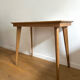 Side table with compass legs
