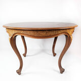 Round dining table of walnut, 1860s