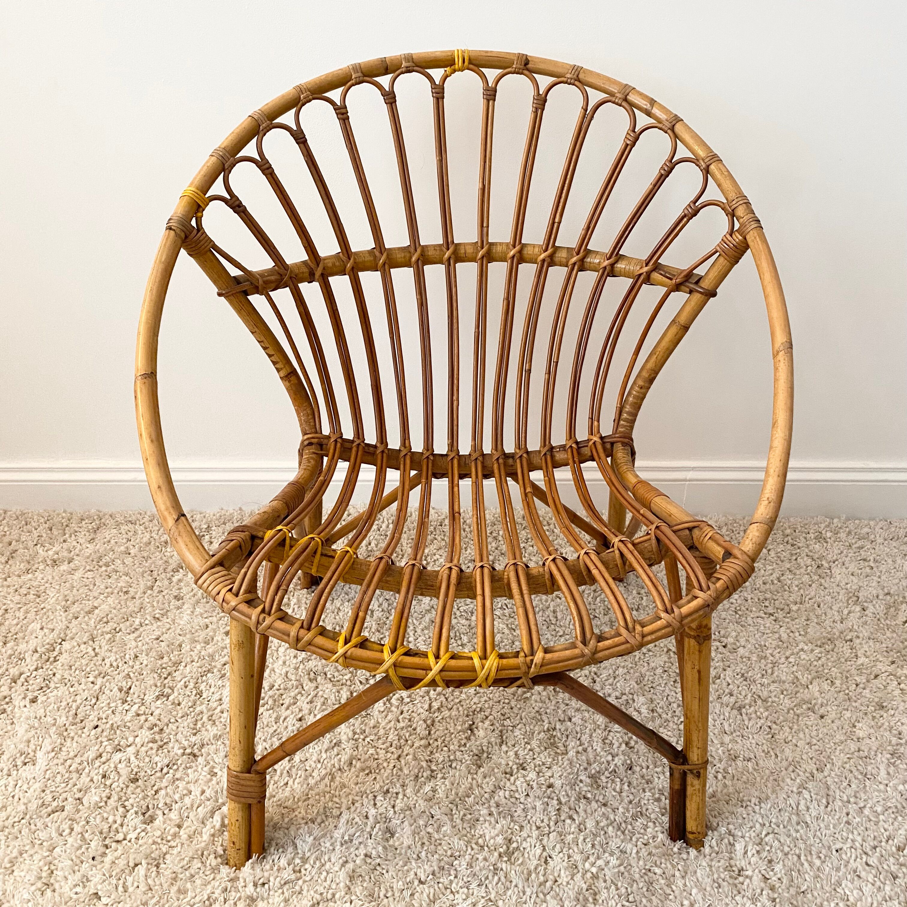 Vintage rattan shell armchair