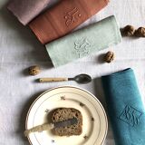 Set of four napkins dyed in multiple colors