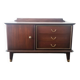 Dark wood sideboard with brass finishes and compass feet