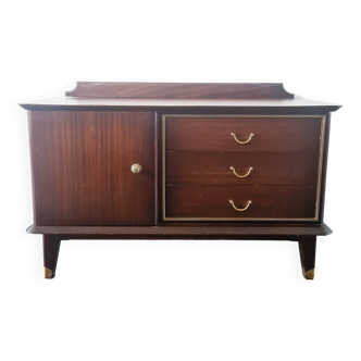 Sideboard in dark wood and brass finishes with compass legs