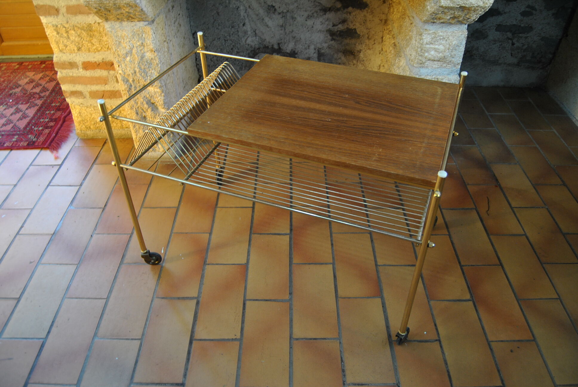 Vinyl storage cabinet with vintage wheels 70s