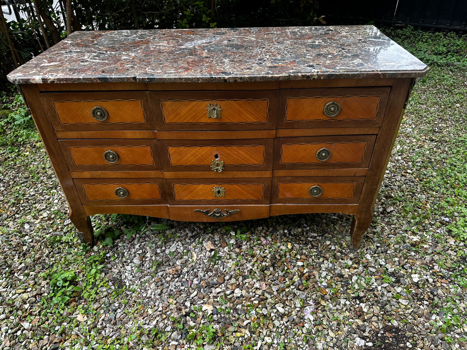 Transitional Louis XV - Louis XVI commode from the 19th century.