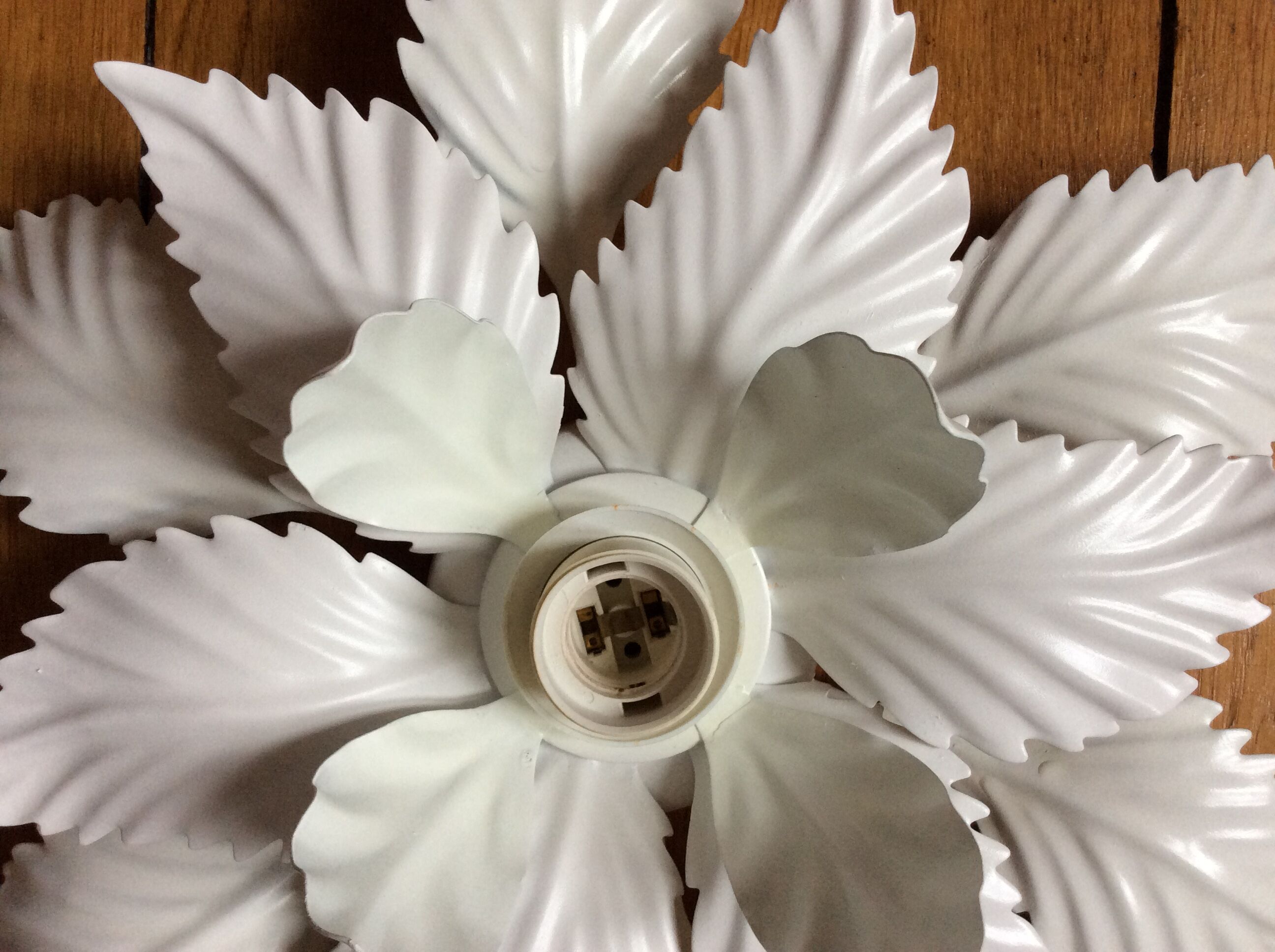 white lacquered metal flower applique