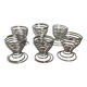 Six metal spiral spring egg cups
