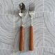 Paire de couverts en inox et olivier