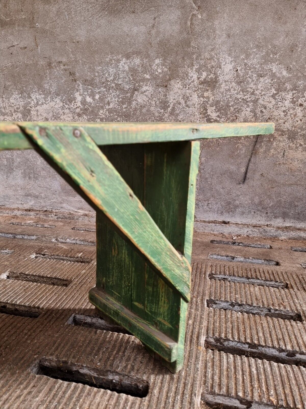 Old wooden bench side table grass green