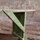 Old wooden bench side table grass green