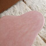 Organic shaped coffee table in pink teracotta tadelakt