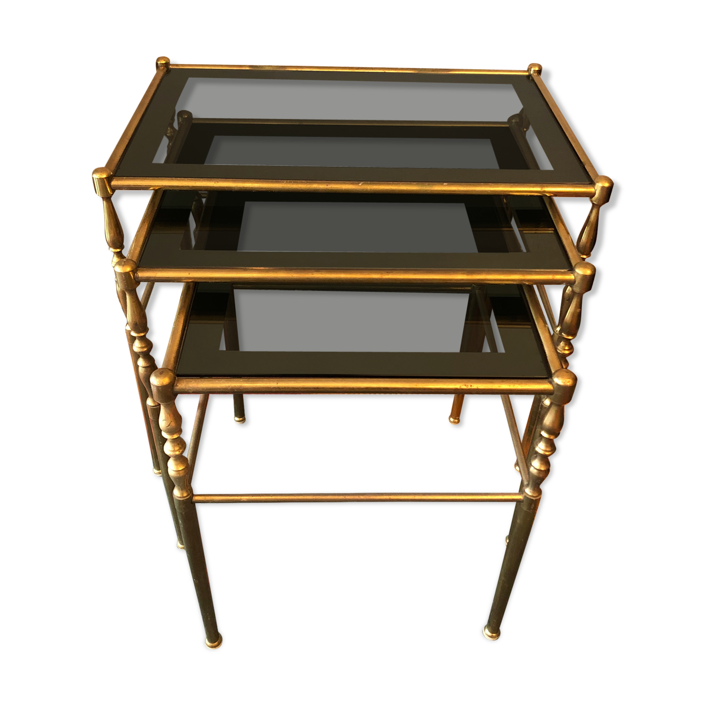 Brass tables and smoked glasses